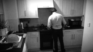 Kal Sabir cooking in the kitchen in short film Eat Me.