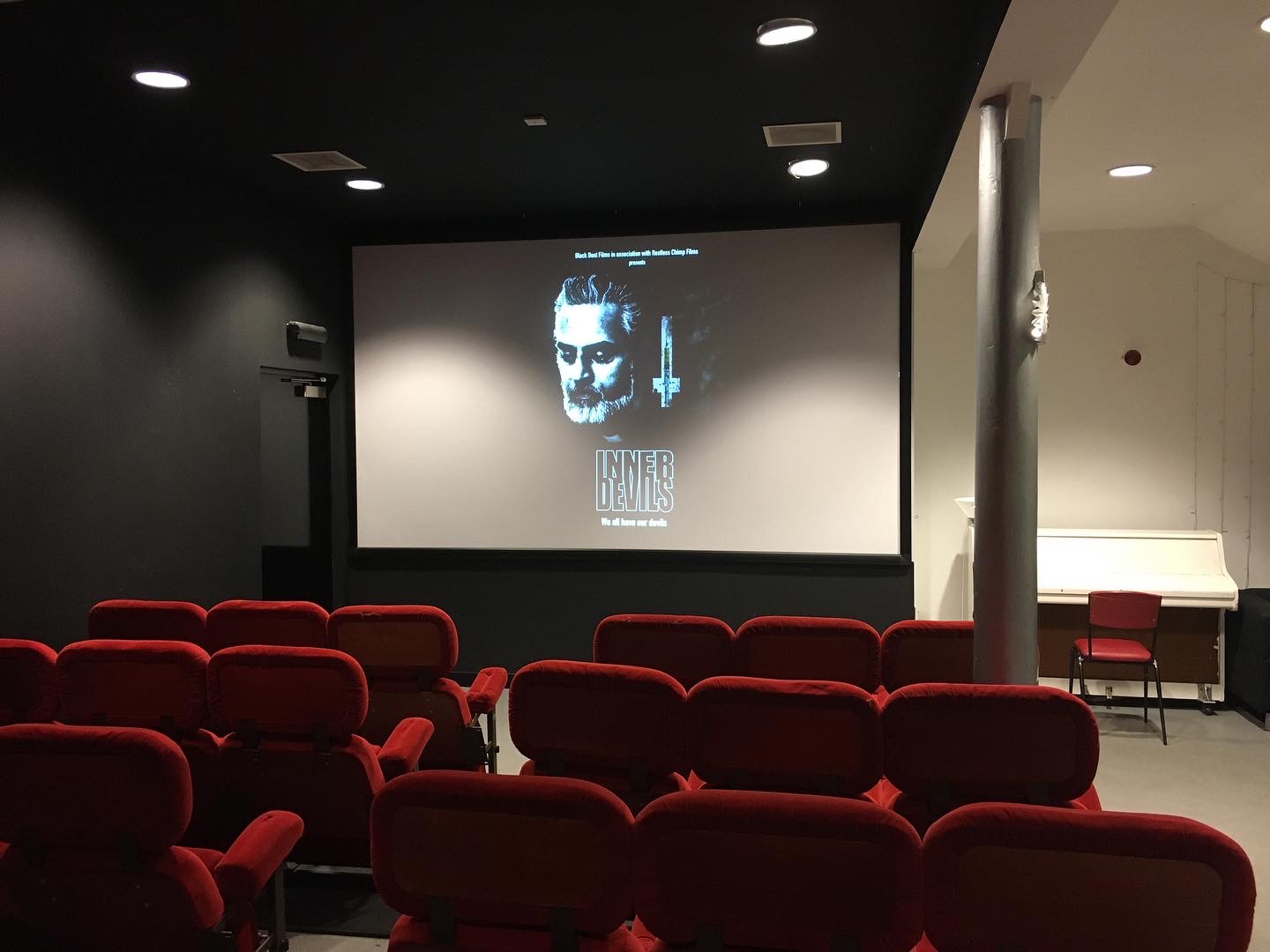 Photo taken at GMAC Film in Glasgow of their cinema screen with the 'Inner Devils' poster on display.